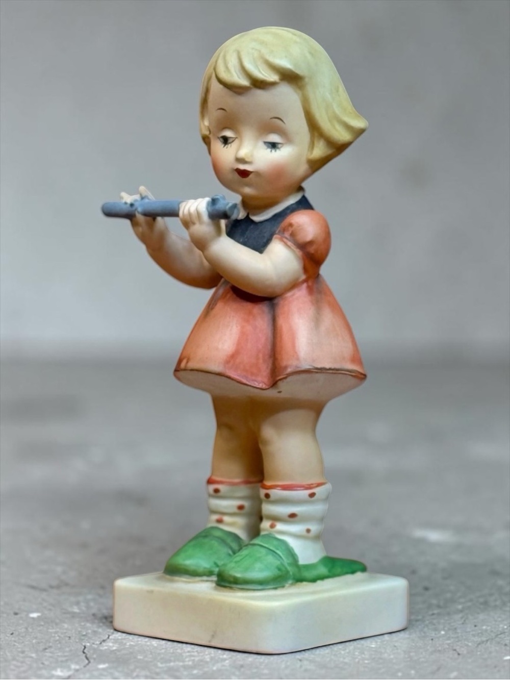 Girl Playing Flute Figurine